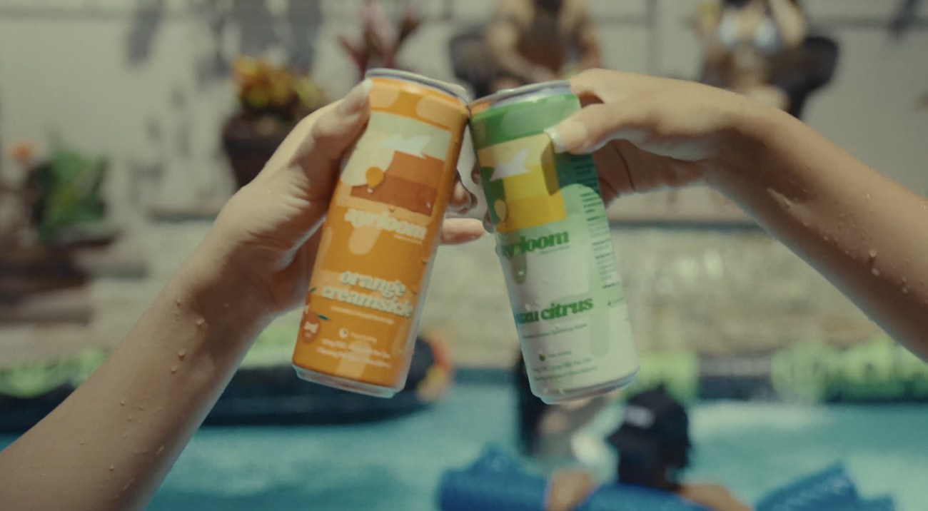 Ayrloom THC drinks enjoyed at a summer pool party
